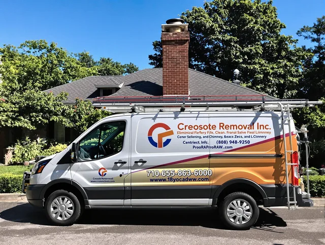 Fort Collins Chimney Sweep technician removing creosote safely in Fort Collins, CO