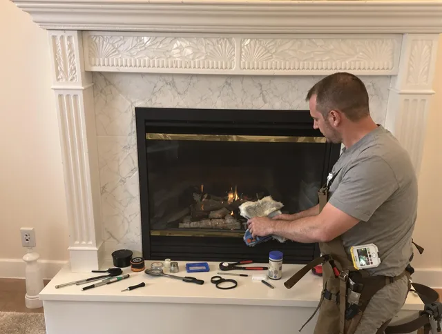 Fort Collins Chimney Sweep performing fireplace maintenance in Fort Collins, CO